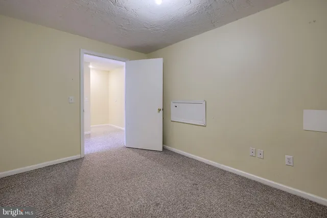 an empty room with an entryway