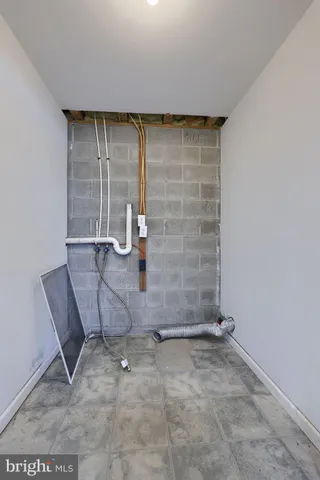 a view of a room with rack on the wall