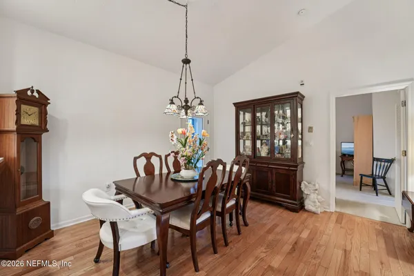 a kitchen with appliances cabinets and a sink