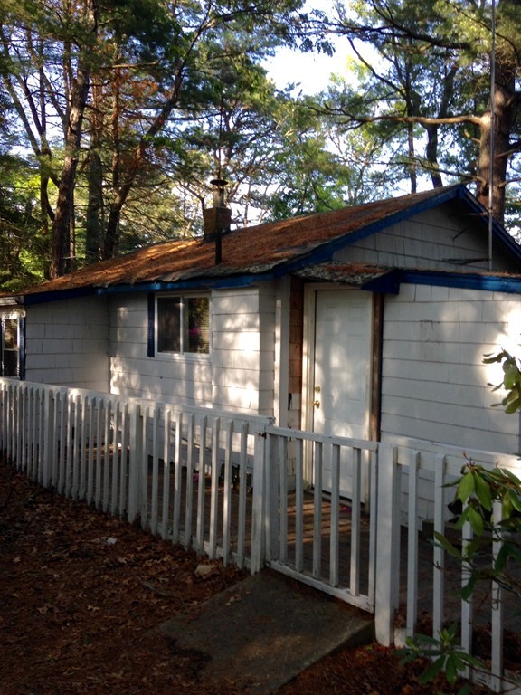 117 Barker Road Wareham, MA 02538 - Photo 1 of 6 a view of a house with a small yard