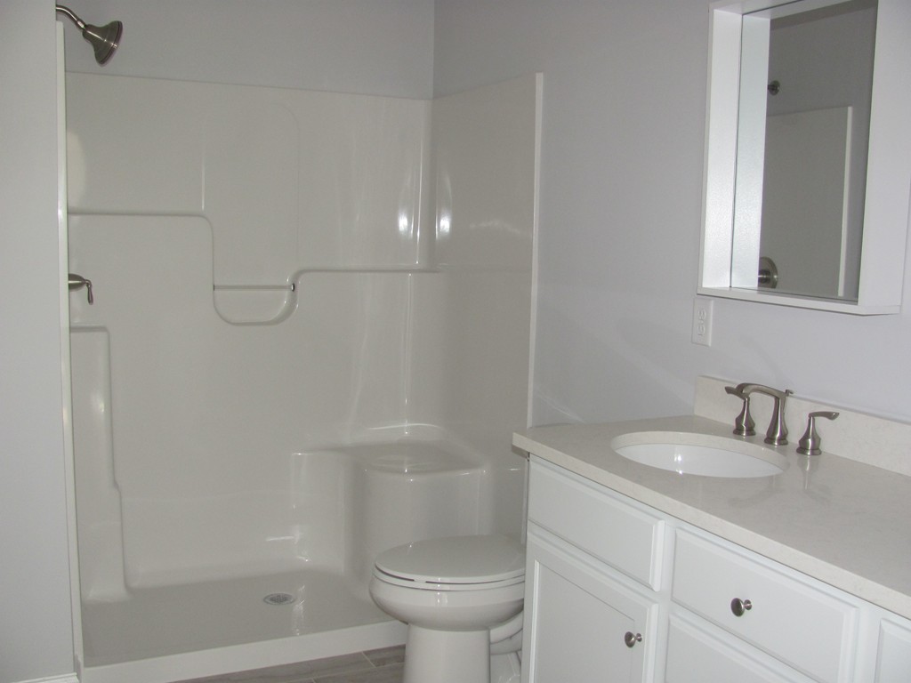 14 Murray Road Ashburnham, MA 01430 - Photo 13 of 15 a bathroom with a sink toilet and shower