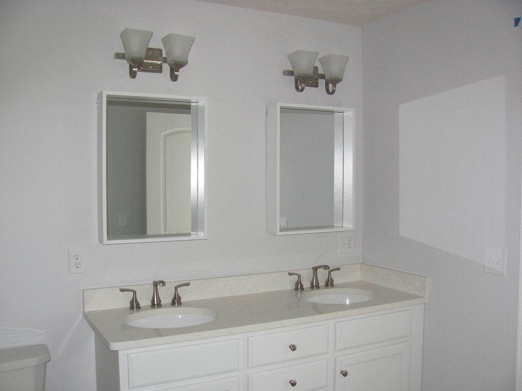 14 Murray Road Ashburnham, MA 01430 - Photo 3 of 15 a bathroom with a sink and a mirror