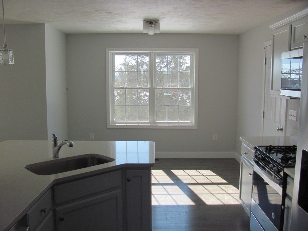 14 Murray Road Ashburnham, MA 01430 - Photo 4 of 15 a kitchen with a sink appliances and a window