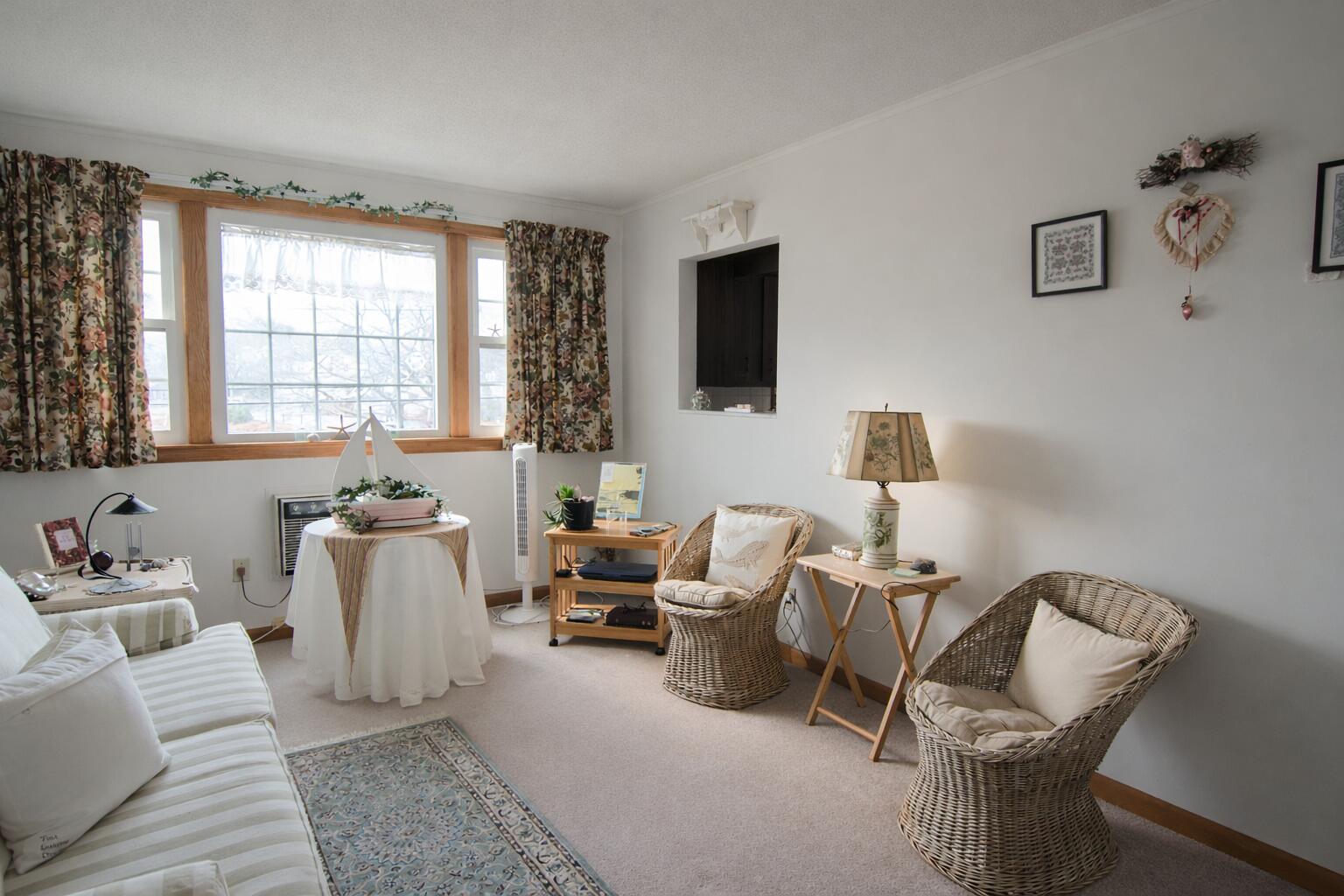 174 Upper County Road, Unit 22 Dennis Port, MA 02639 - Photo 3 of 15 Inviting living room with natural light