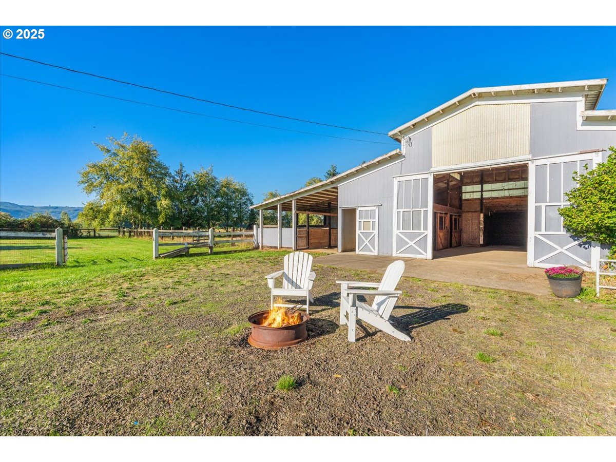 78527 Point Adams Road Clatskanie, OR 97016 - Photo 42 of 46 a view of a house with backyard porch and sitting area