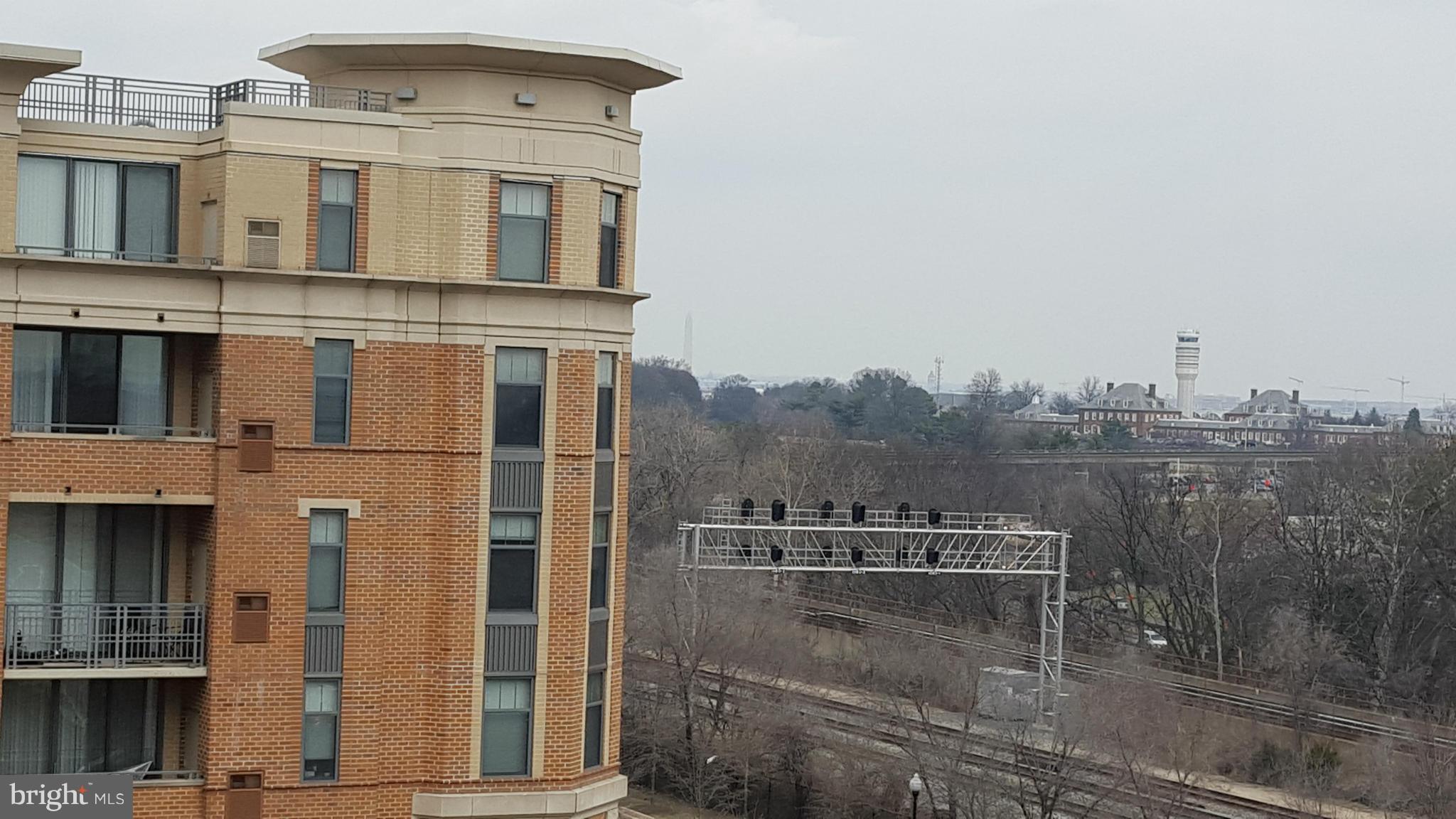3650 South Glebe Road, Unit 649 Arlington, VA 22202 - Photo 21 of 22 a view of a building with a outdoor space