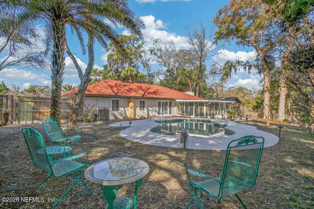 3389 Hermitage Road East Jacksonville, FL 32277 - Photo 32 of 37 hermitage firepit sitting area