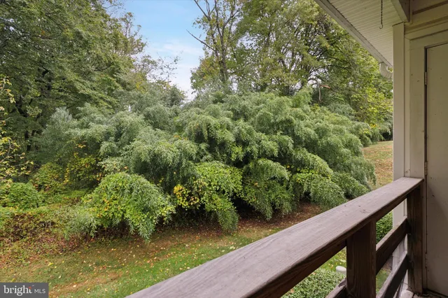 a view of a lake from a balcony
