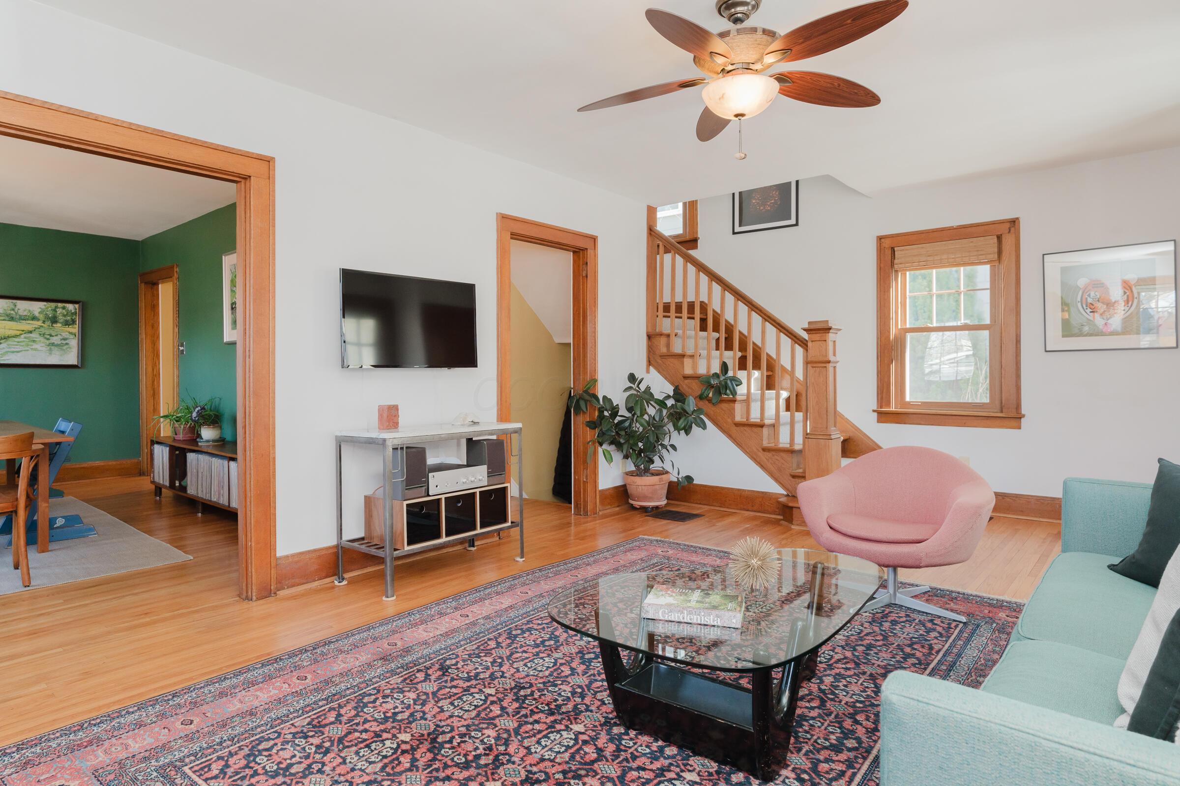 278 Crestview Road Columbus, OH 43202 - Photo 11 of 50 Light, bright and beautiful living space is highlighted by wood flooring, complemented by the natural woodwork.