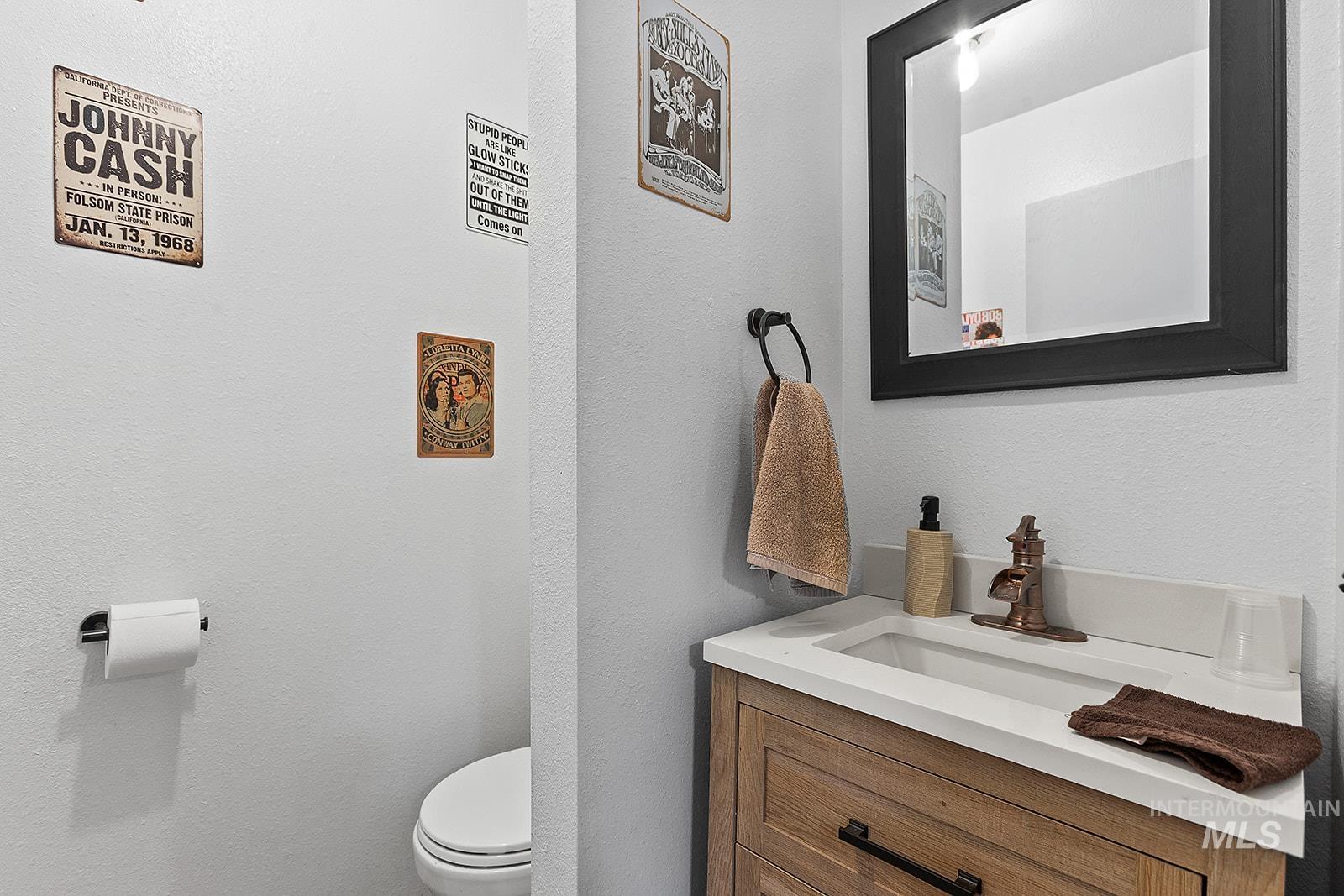 25314 Soldiers Meadow Road Winchester, ID 83555 - Photo 20 of 45 Bathroom featuring vanity and a textured wall