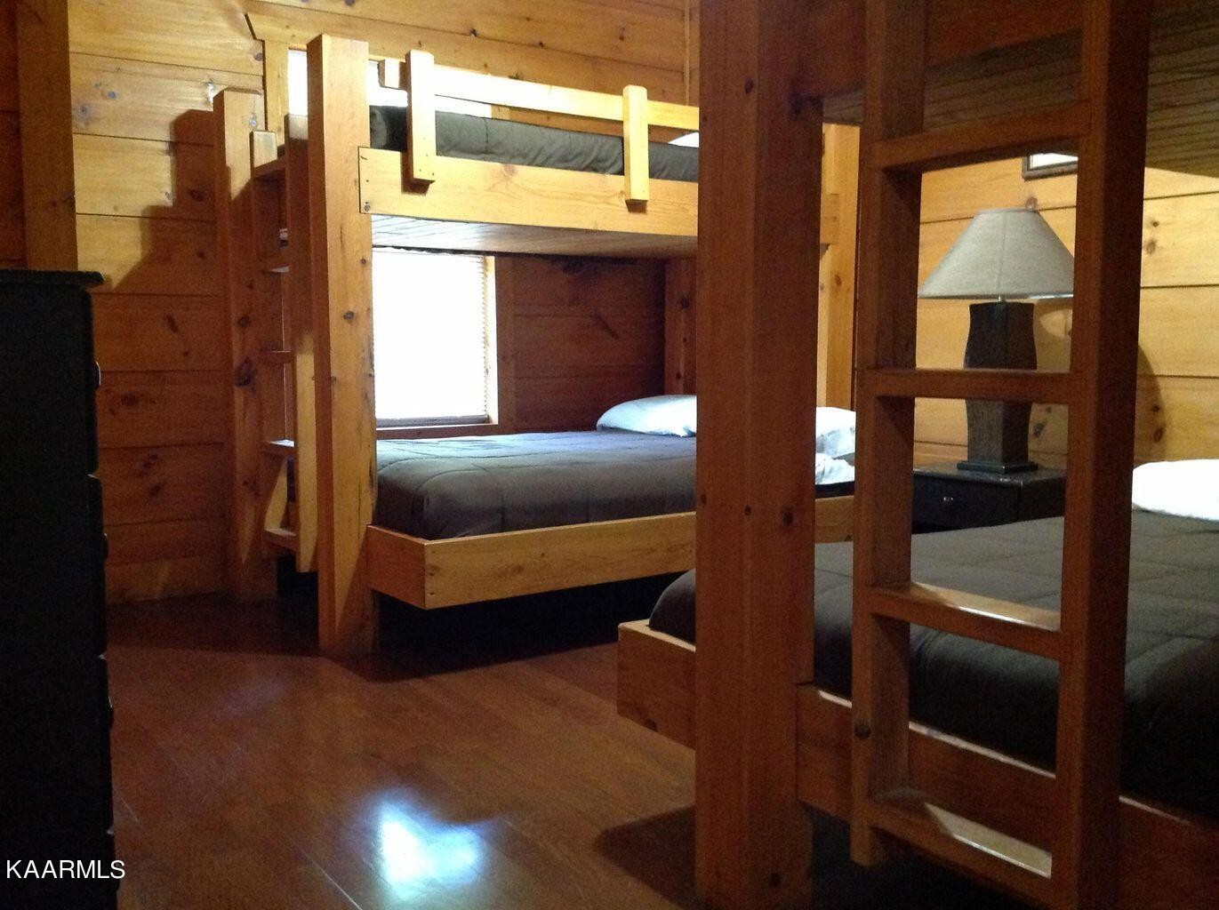 315 Windrock Road Oliver Springs, TN 37840 - Photo 32 of 36 a bedroom with a bed and a window