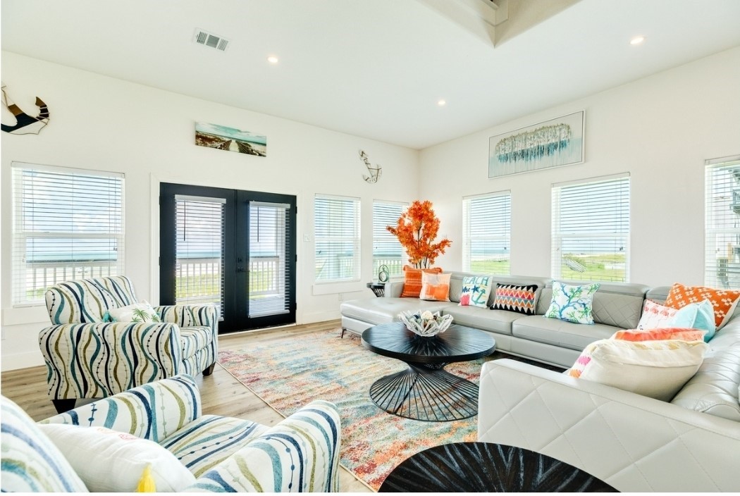 23245 Termini-San Luis Pass Road Galveston, TX 77554 - Photo 15 of 45 a living room with furniture and a large window