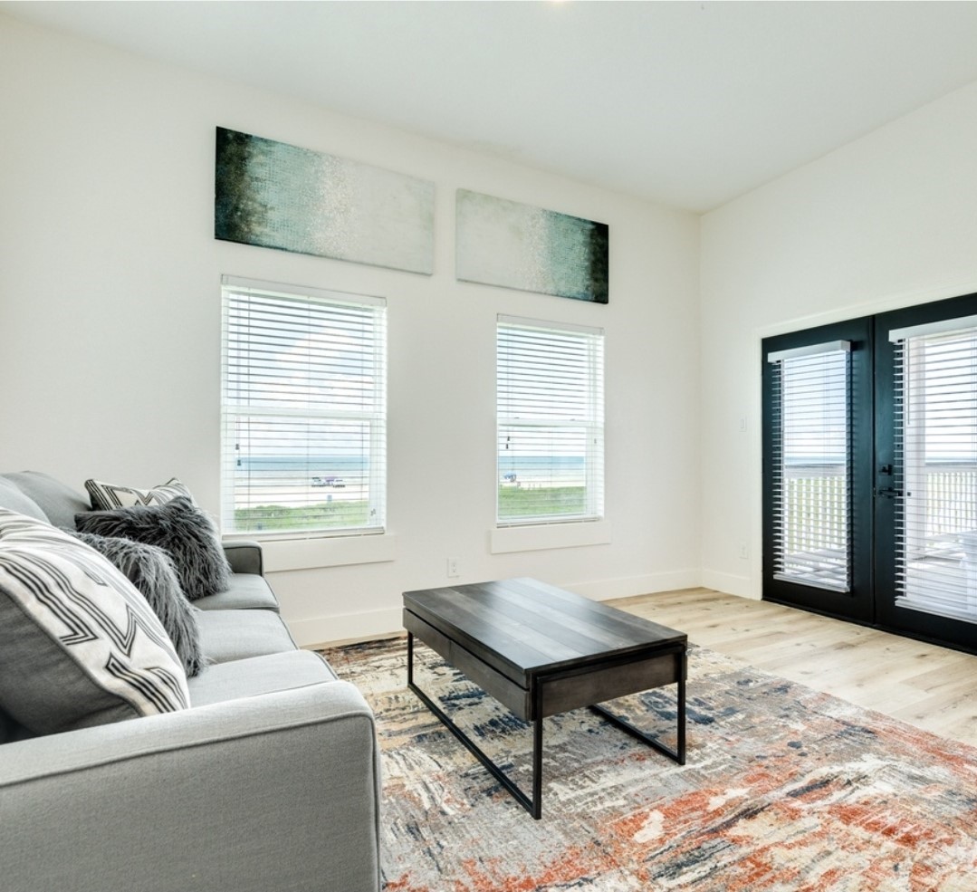 23245 Termini-San Luis Pass Road Galveston, TX 77554 - Photo 29 of 45 a living room with furniture and a window