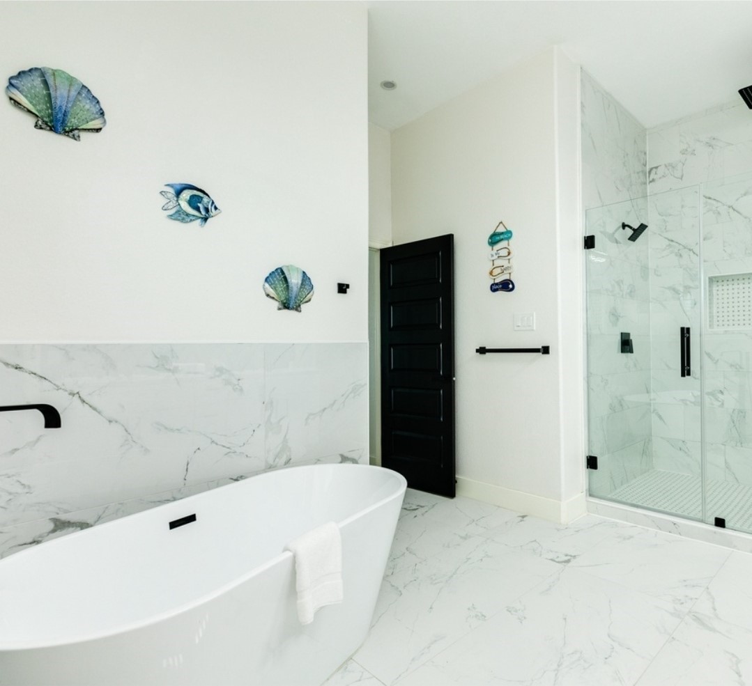 23245 Termini-San Luis Pass Road Galveston, TX 77554 - Photo 30 of 45 a bathroom with a bathtub and shower