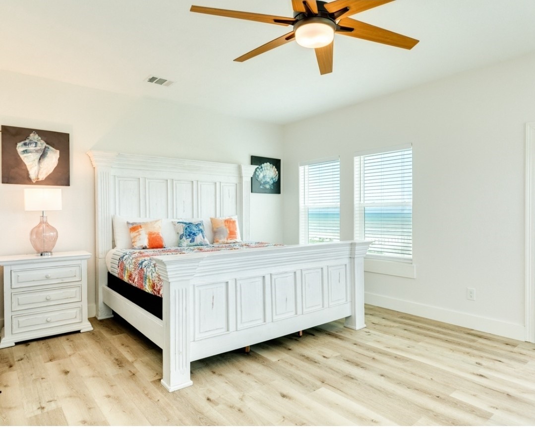 23245 Termini-San Luis Pass Road Galveston, TX 77554 - Photo 33 of 45 a bed room with a bed and window
