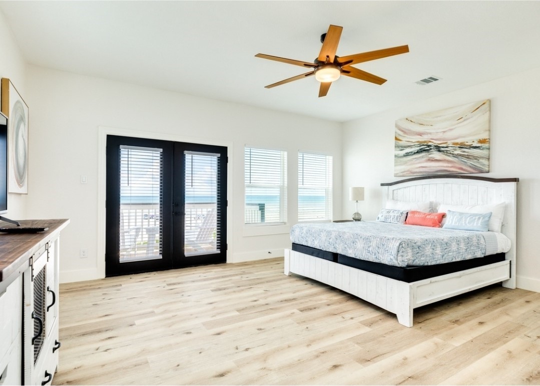 23245 Termini-San Luis Pass Road Galveston, TX 77554 - Photo 39 of 45 a living room with granite countertop furniture and a ceiling fan