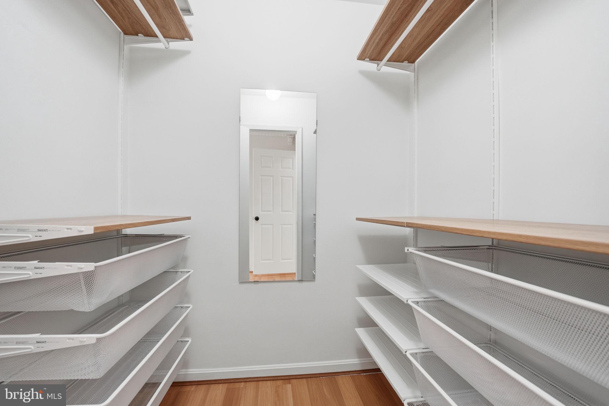8967 Omega Court Springfield, VA 22152 - Photo 15 of 31 a view of an empty walk in closet