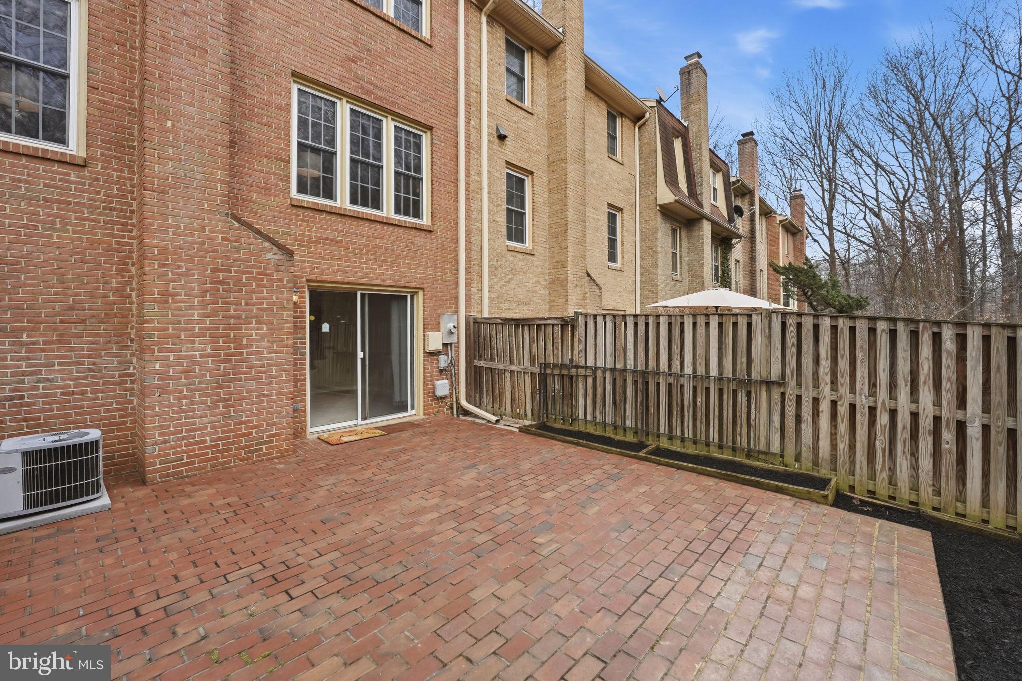 8967 Omega Court Springfield, VA 22152 - Photo 26 of 31 a view of a building with many windows
