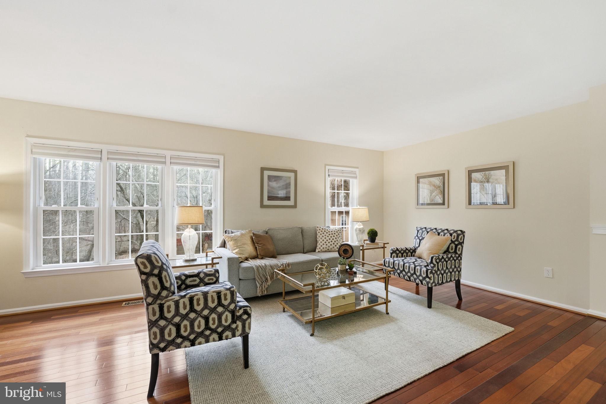 8967 Omega Court Springfield, VA 22152 - Photo 4 of 31 a living room with furniture and wooden floor