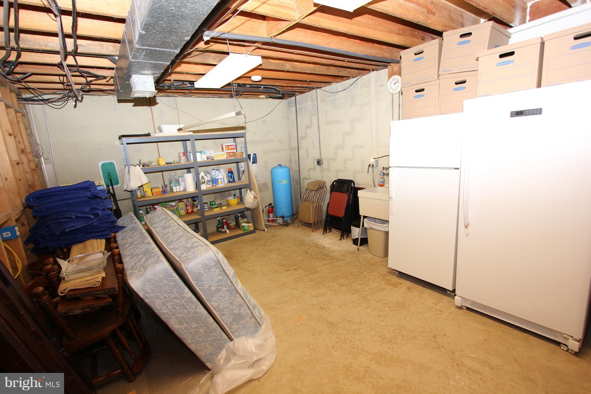 10303 Greystone Road Manassas, VA 20111 - Photo 23 of 27 Laundry and storage