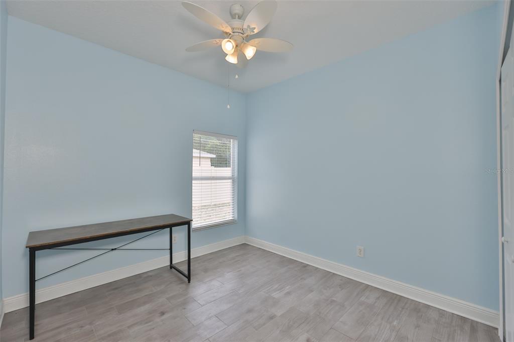 708 Coade Stone Drive Seffner, FL 33584 - Photo 21 of 48 a view of empty room with a window