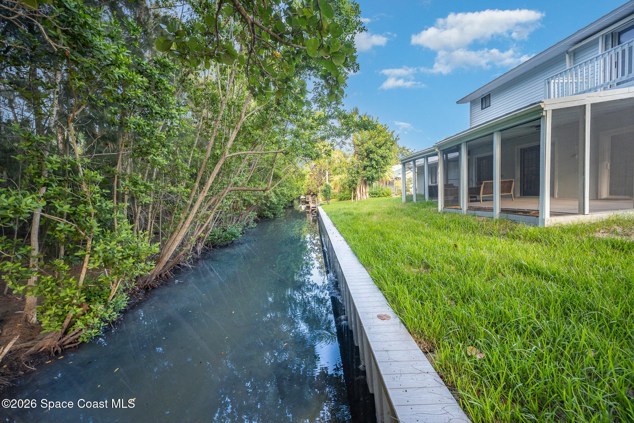 362 Nikomas Way Melbourne Beach, FL 32951 - Photo 27 of 32 a view of a house with backyard