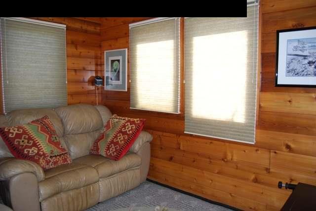 2120 Lilikoi Road Haiku, HI 96708 - Photo 14 of 29 a living room with furniture and a window