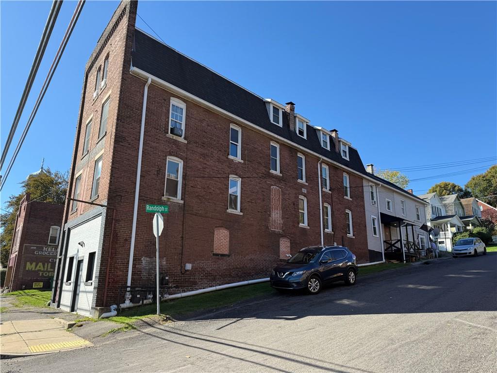 601 Kendall Avenue Lyndora, PA 16045 - Photo 2 of 50 a car parked in front of a building