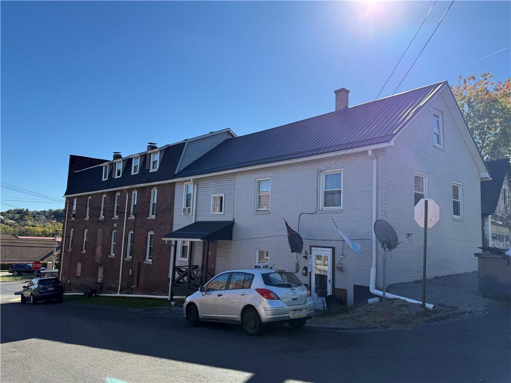 601 Kendall Avenue Lyndora, PA 16045 - Photo 3 of 50 a car parked in front of a house