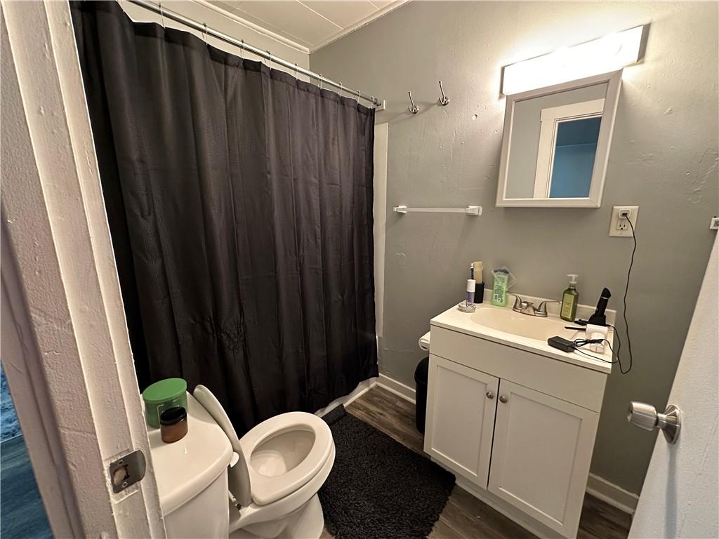 601 Kendall Avenue Lyndora, PA 16045 - Photo 32 of 50 a bathroom with a sink a toilet and shower