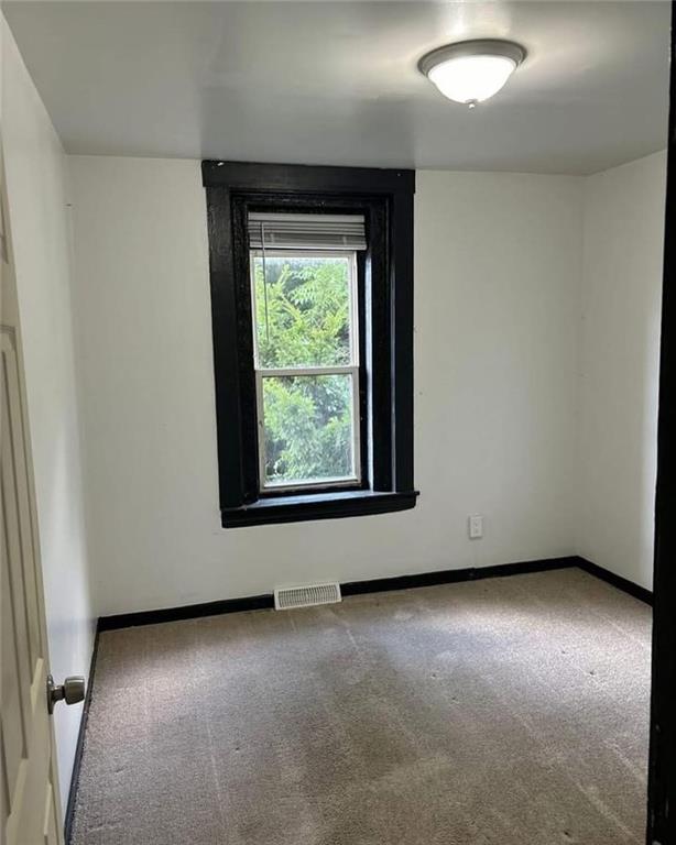 601 Kendall Avenue Lyndora, PA 16045 - Photo 41 of 50 an empty room with a window