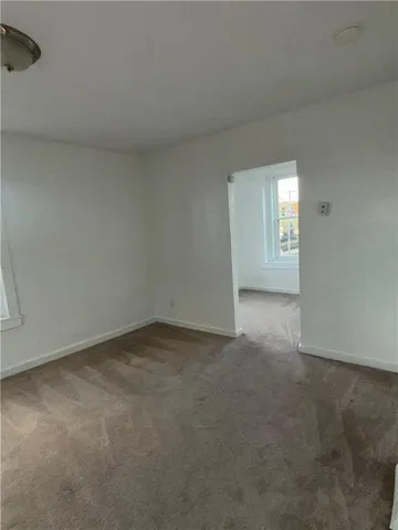 a bathroom with a sink a toilet and bathtub