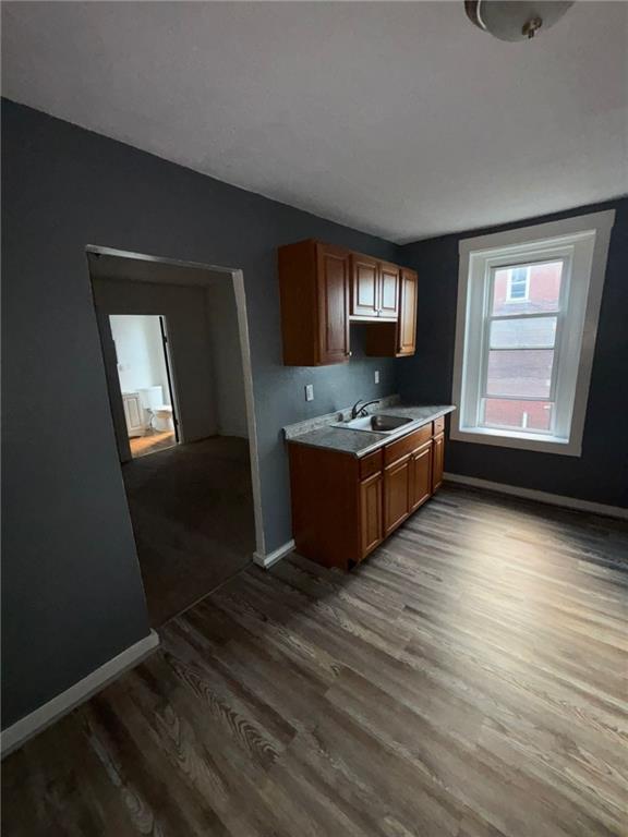 601 Kendall Avenue Lyndora, PA 16045 - Photo 49 of 50 a living room with stainless steel appliances wooden floors and view kitchen