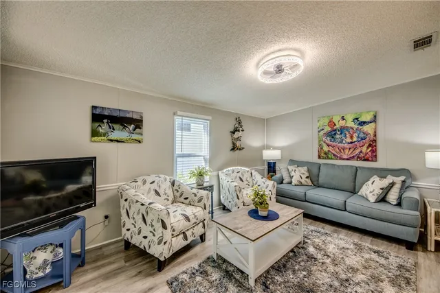 a bathroom with a toilet a sink and a shower