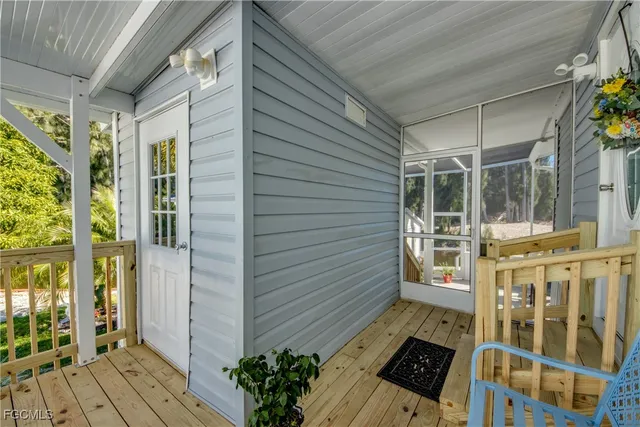 a dining room with furniture and garden view
