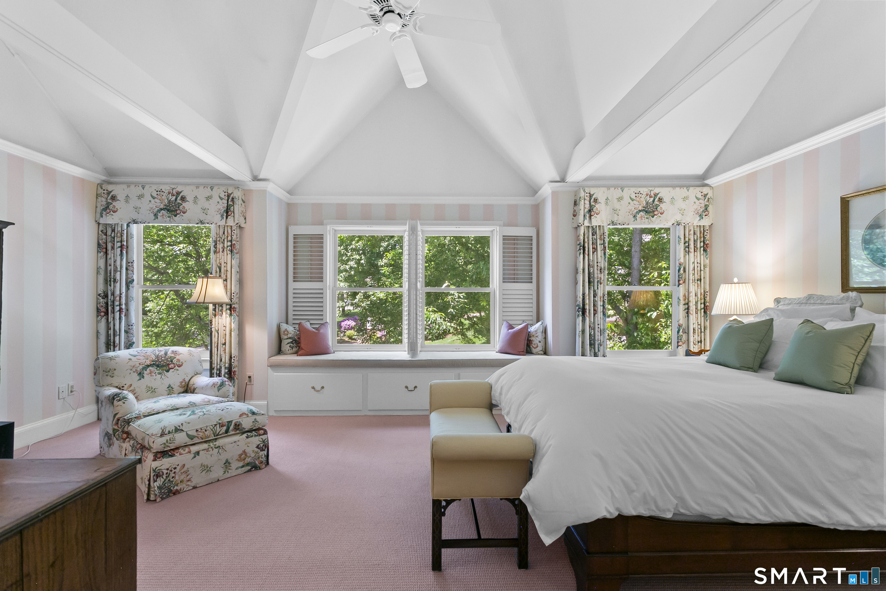 936 South Pine Creek Road Fairfield, CT 06824 - Photo 17 of 39 This primary bedroom en-suite is so peaceful and serene with gorgeous views of the Gazebo and gardens.