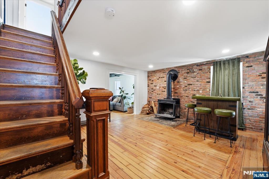 343-339 Quaker Church Road Randolph, NJ 07869 - Photo 20 of 38 a living room with furniture and a fireplace