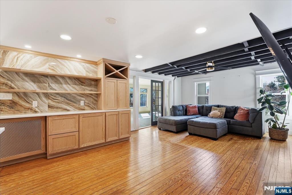 343-339 Quaker Church Road Randolph, NJ 07869 - Photo 25 of 38 a living room with furniture and wooden floor