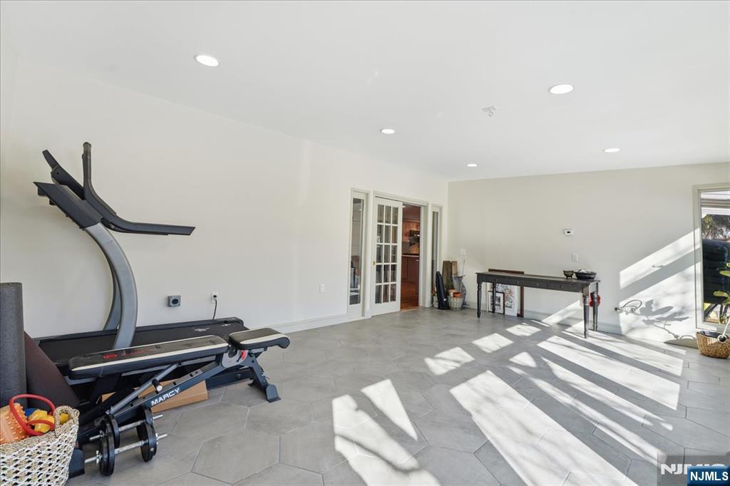 343-339 Quaker Church Road Randolph, NJ 07869 - Photo 30 of 38 a living room with furniture a piano and white walls
