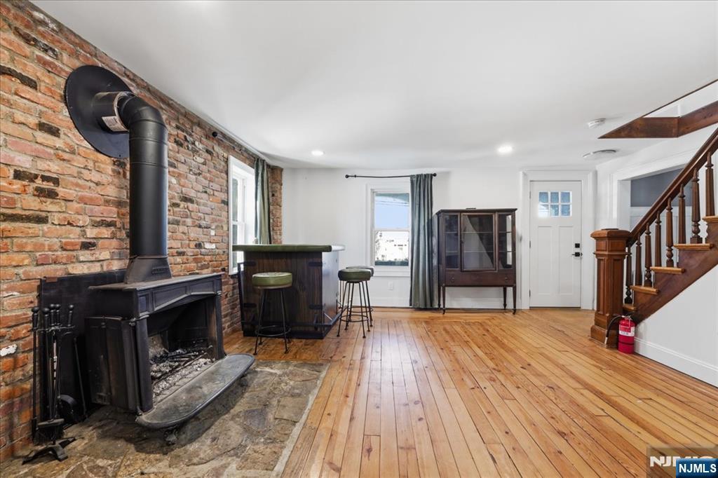 343-339 Quaker Church Road Randolph, NJ 07869 - Photo 37 of 38 a view of a livingroom with furniture and a fireplace