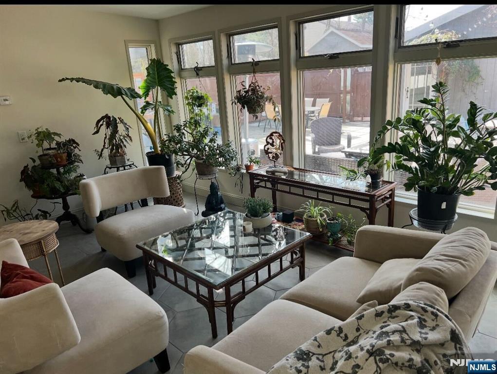 343-339 Quaker Church Road Randolph, NJ 07869 - Photo 4 of 38 a living room with furniture and a large window