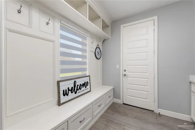 a view of a hallway with entryway