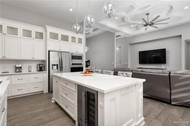 a view of living room with furniture and flat screen tv