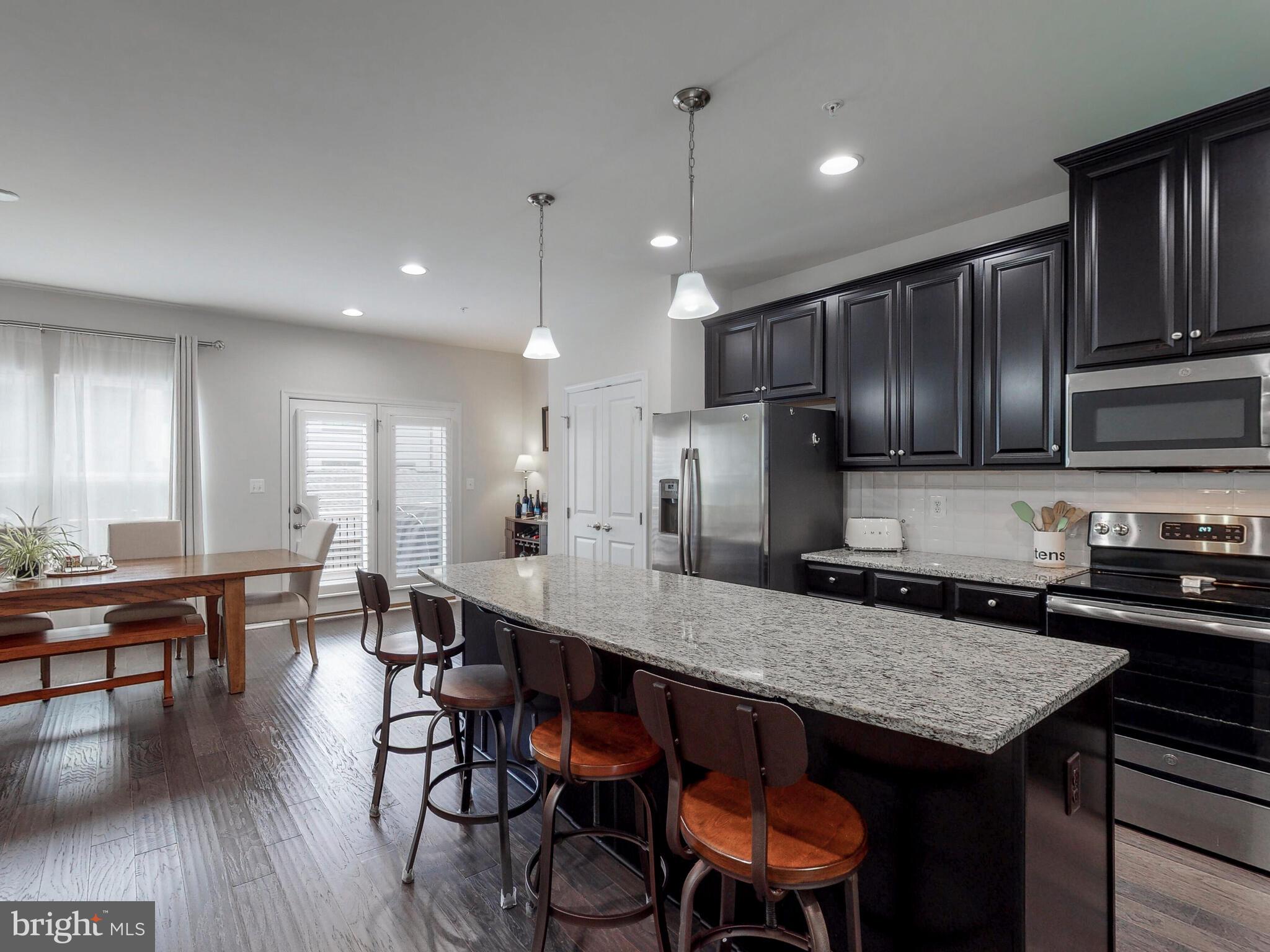 413 Colindale Street Baltimore, MD 21220 - Photo 15 of 48 Gorgeous 42" cabinets with large island & granite