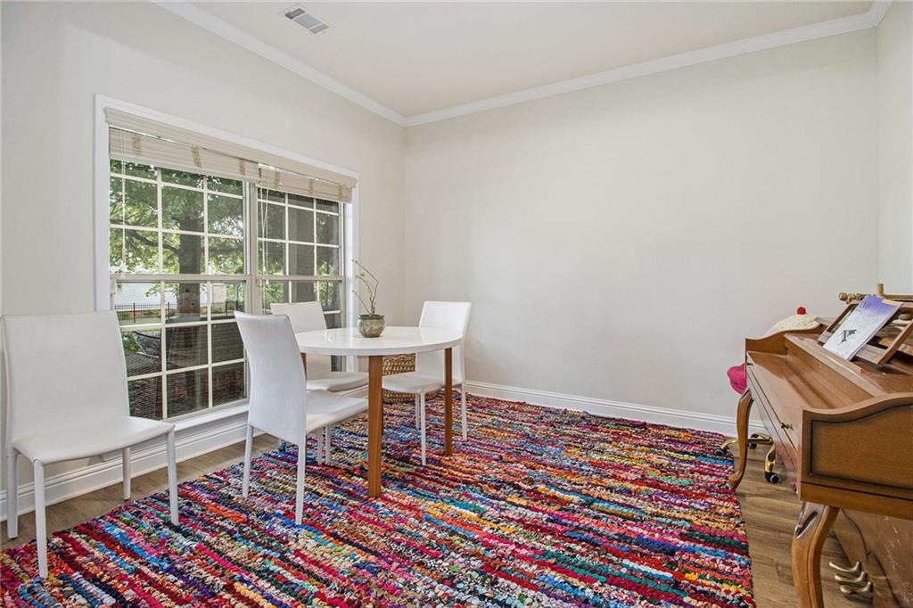 218 Third Avenue Avondale Estates, GA 30002 - Photo 7 of 26 a workspace with furniture rug and a window