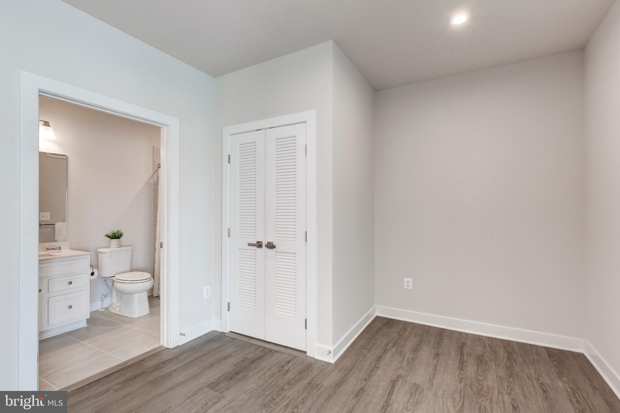 40 Liberty Road, Unit T Sykesville, MD 21784 - Photo 17 of 31 a view of a room with wooden floor and closet