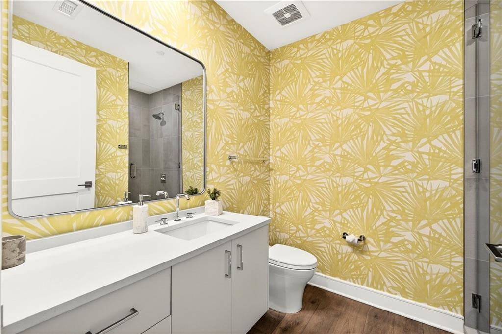 2520 Peachtree Road Northwest, Unit 1003 Atlanta, GA 30305 - Photo 14 of 63 a bathroom with a sink and a mirror