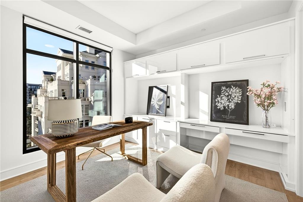 2520 Peachtree Road Northwest, Unit 1003 Atlanta, GA 30305 - Photo 15 of 63 a view of a dining room with furniture and window