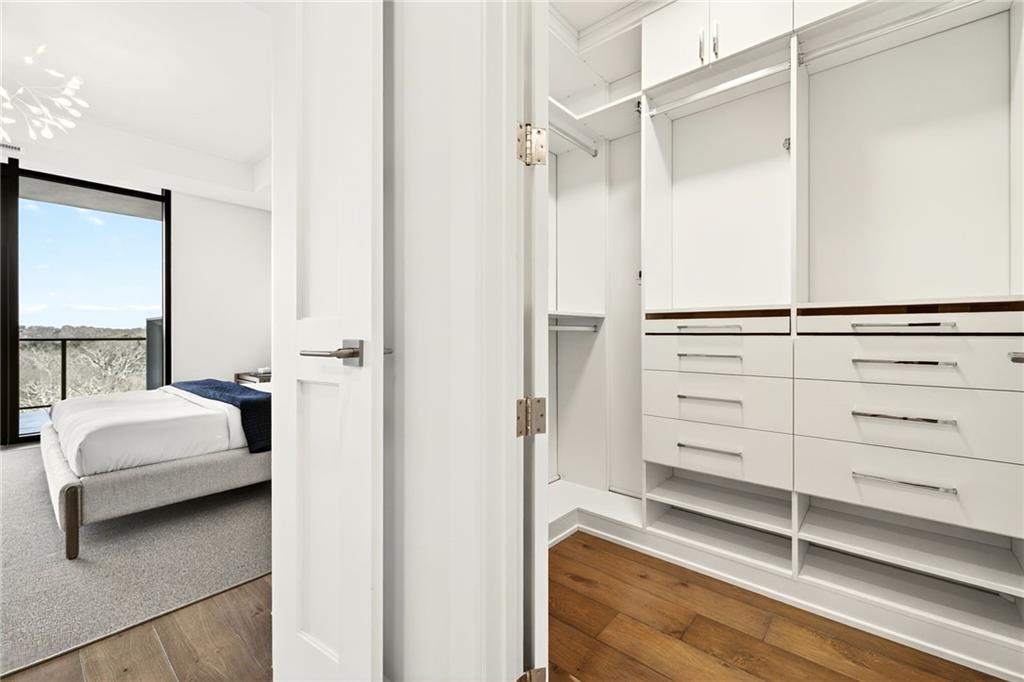2520 Peachtree Road Northwest, Unit 1003 Atlanta, GA 30305 - Photo 24 of 63 a view of bedroom with furniture and window
