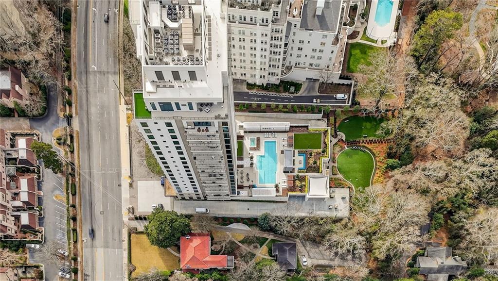 2520 Peachtree Road Northwest, Unit 1003 Atlanta, GA 30305 - Photo 38 of 63 an aerial view of multi story residential apartment building with yard